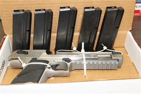 James Patrick handgun with ammo Patrick handgun with ammo